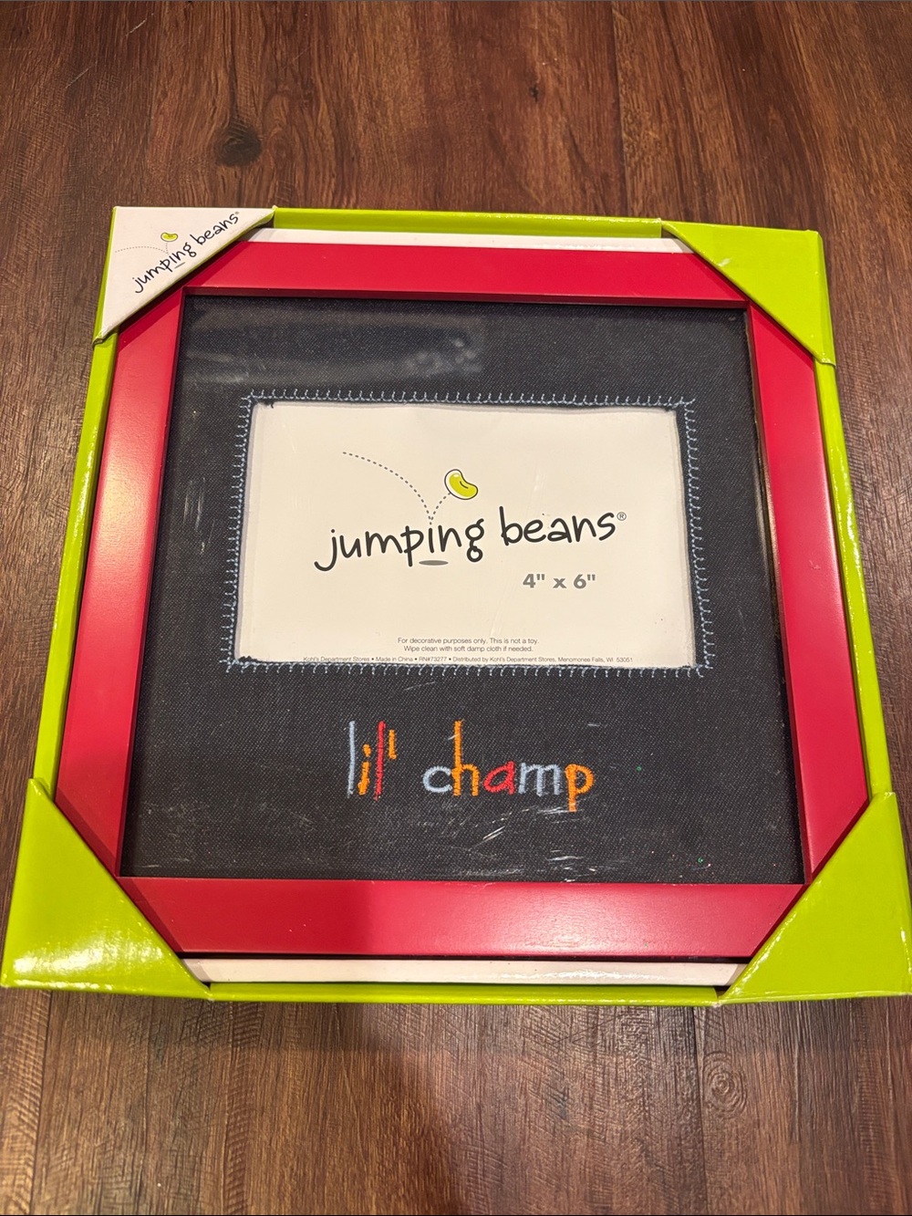 jumping beans red photo frame with embroidered 'lil champ' mat 4x6
